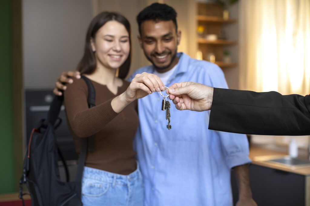 A couple receiving the keys to their new home 