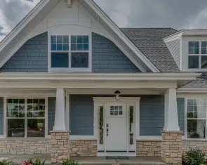 suburban home with blue vinyl siding in VA